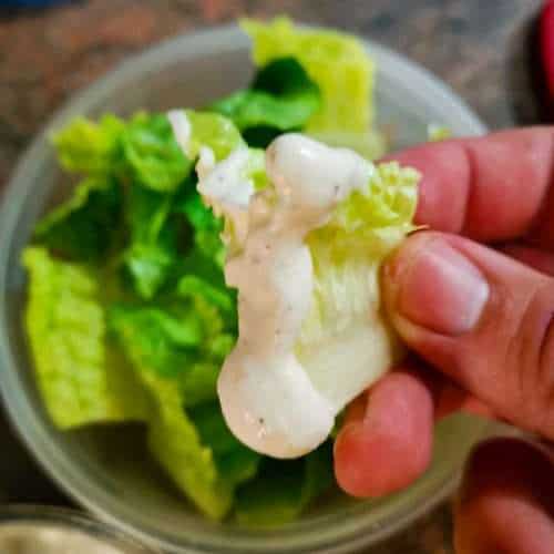 Romaine lettuce used as a low carb chip with dip on it