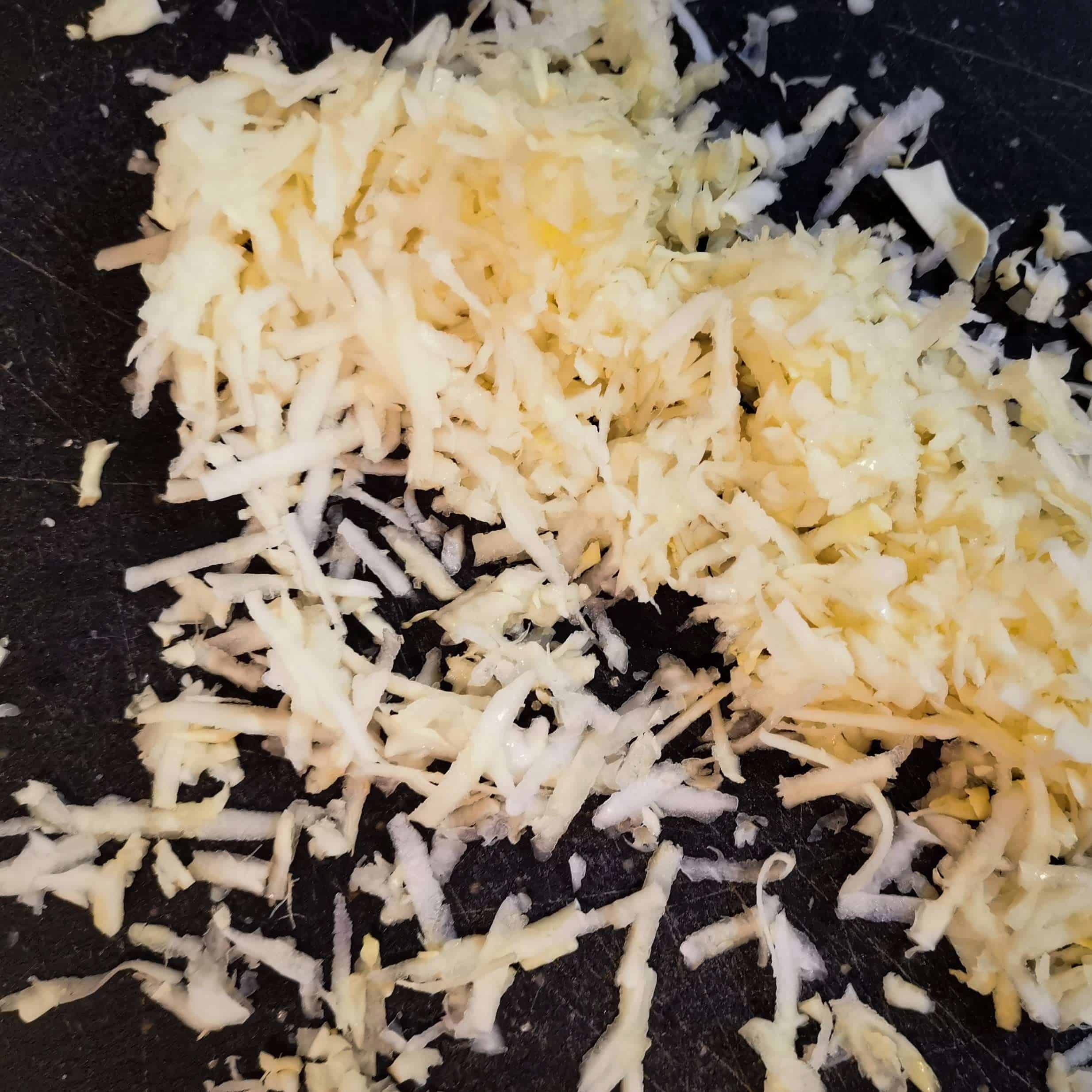 White Cabbage shredded with a cheese grater for BLT keto coleslaw