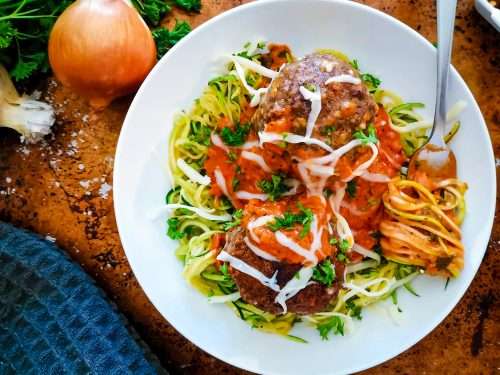 Low Carb Spaghetti and Meatballs served with garnish