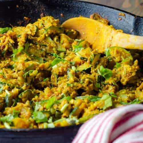 Low Carb Zucchini and Egg Bhaji in a cast iron skillet