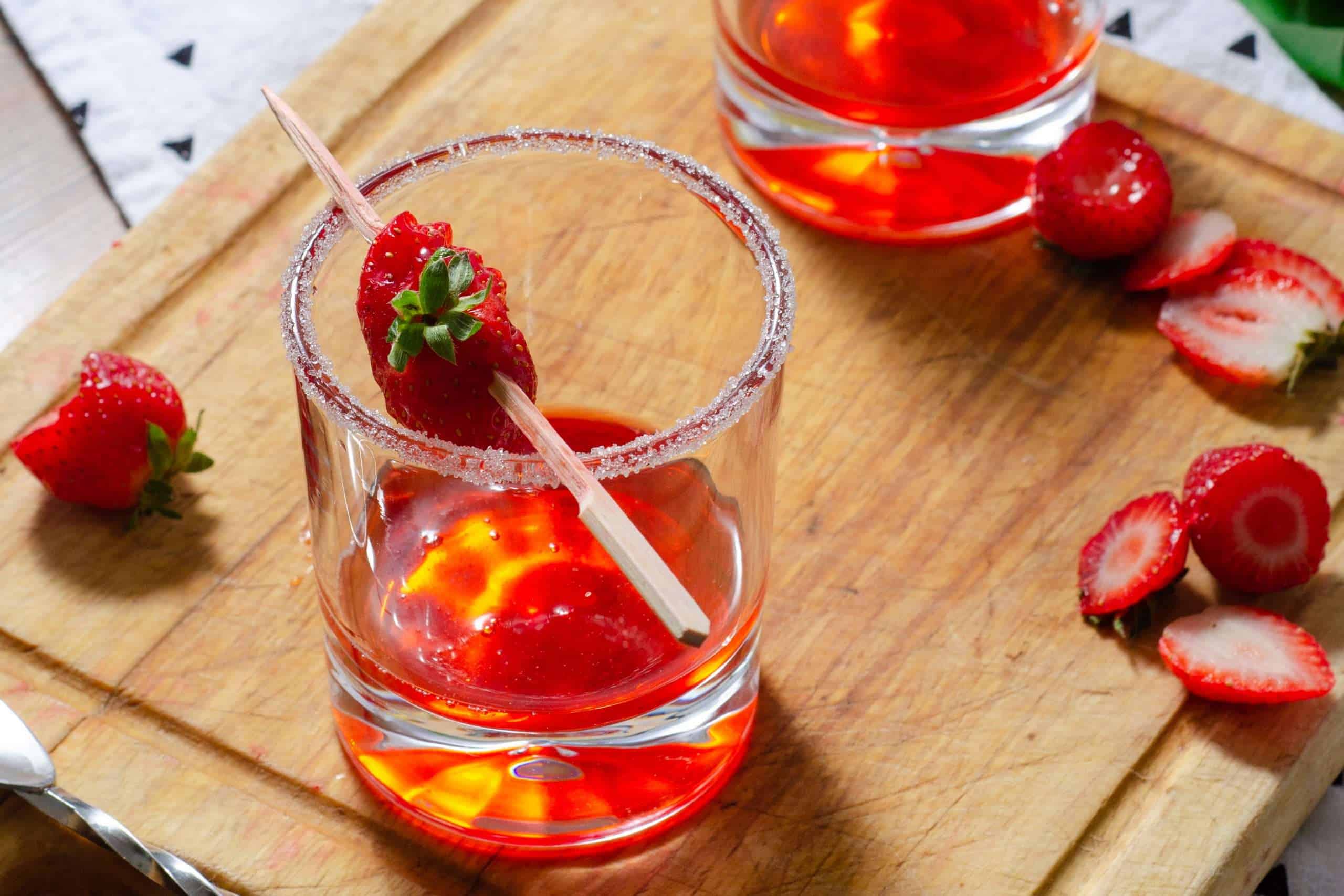 Strawberry flavoured simple syrup in a cocktail glass