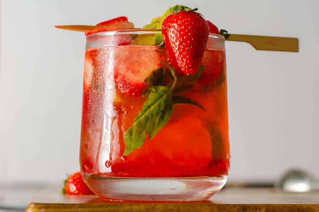 Low Carb Strawberry Basil Mojito dressed in a glass