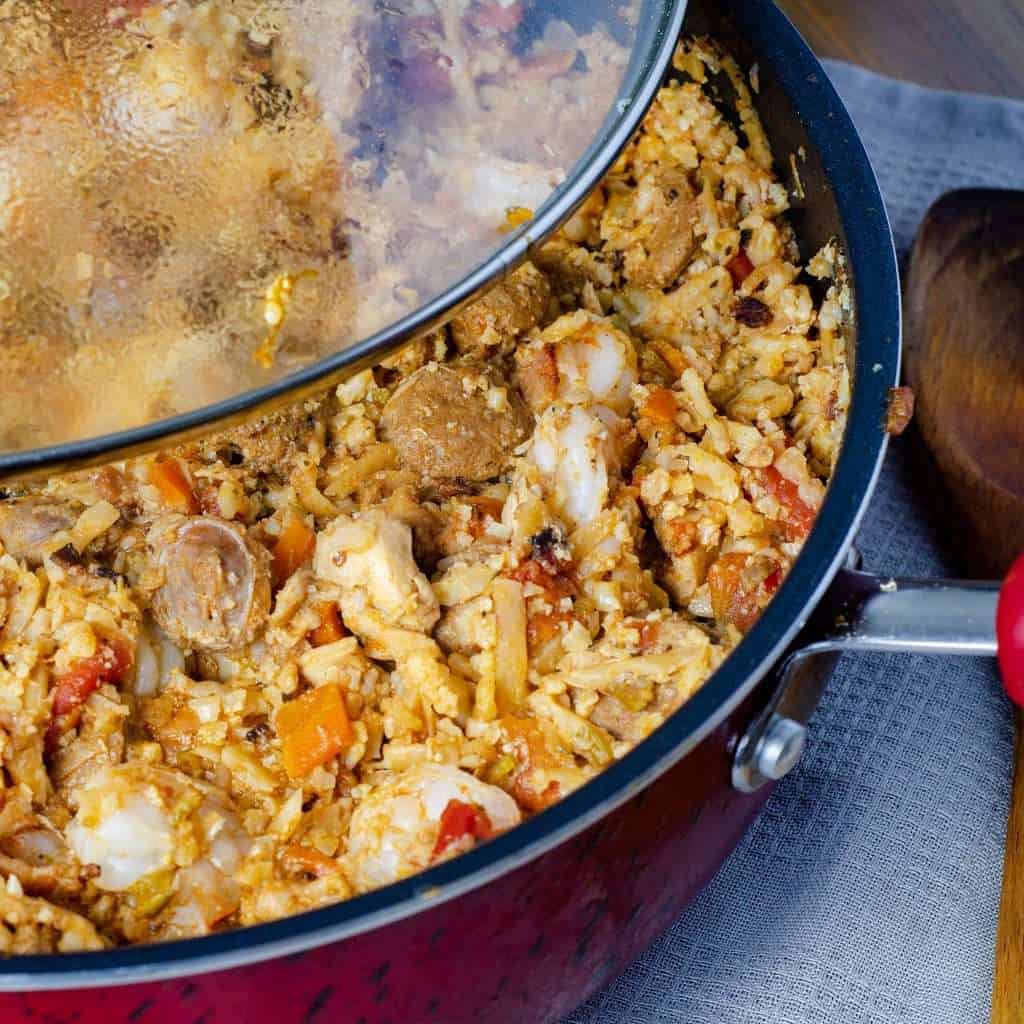Keto jambalaya in a pot with a lid ready to eat