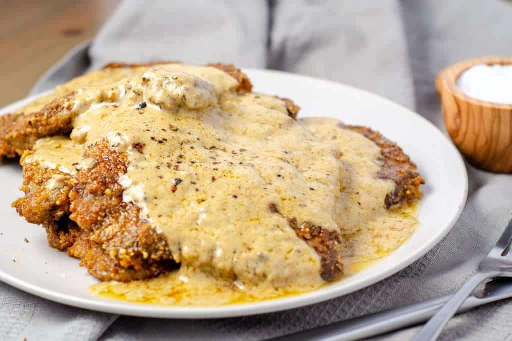 Carnivore country Fried Steak with Country Pan Gravy on a plate