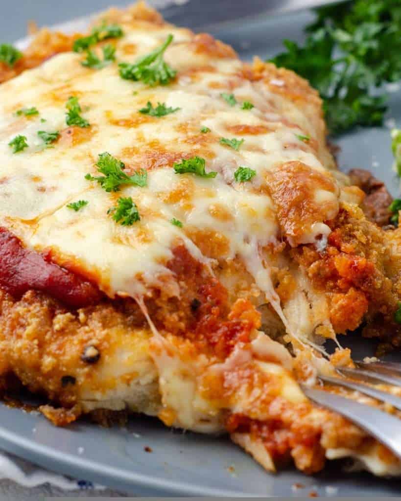 Keto Chicken Parmesan topped with melty mozzarella cheese