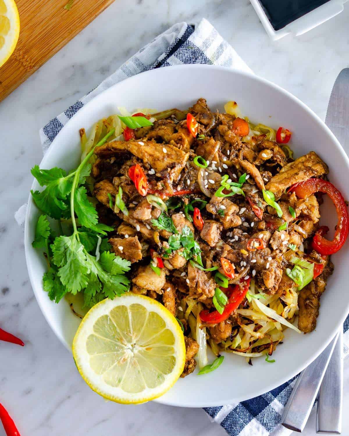 Keto Thai ginger Pork garnished in a bowl from above