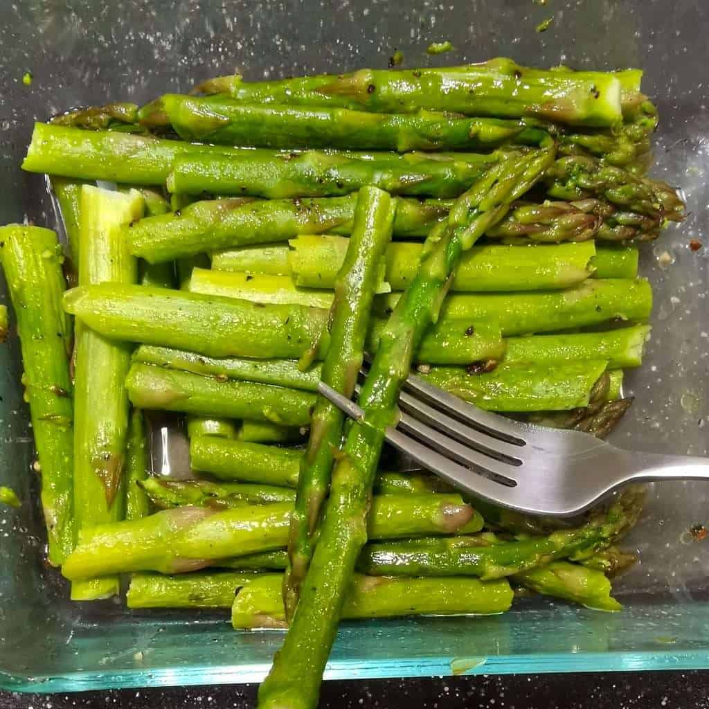 Microwave Steamed Asparagus on a fork