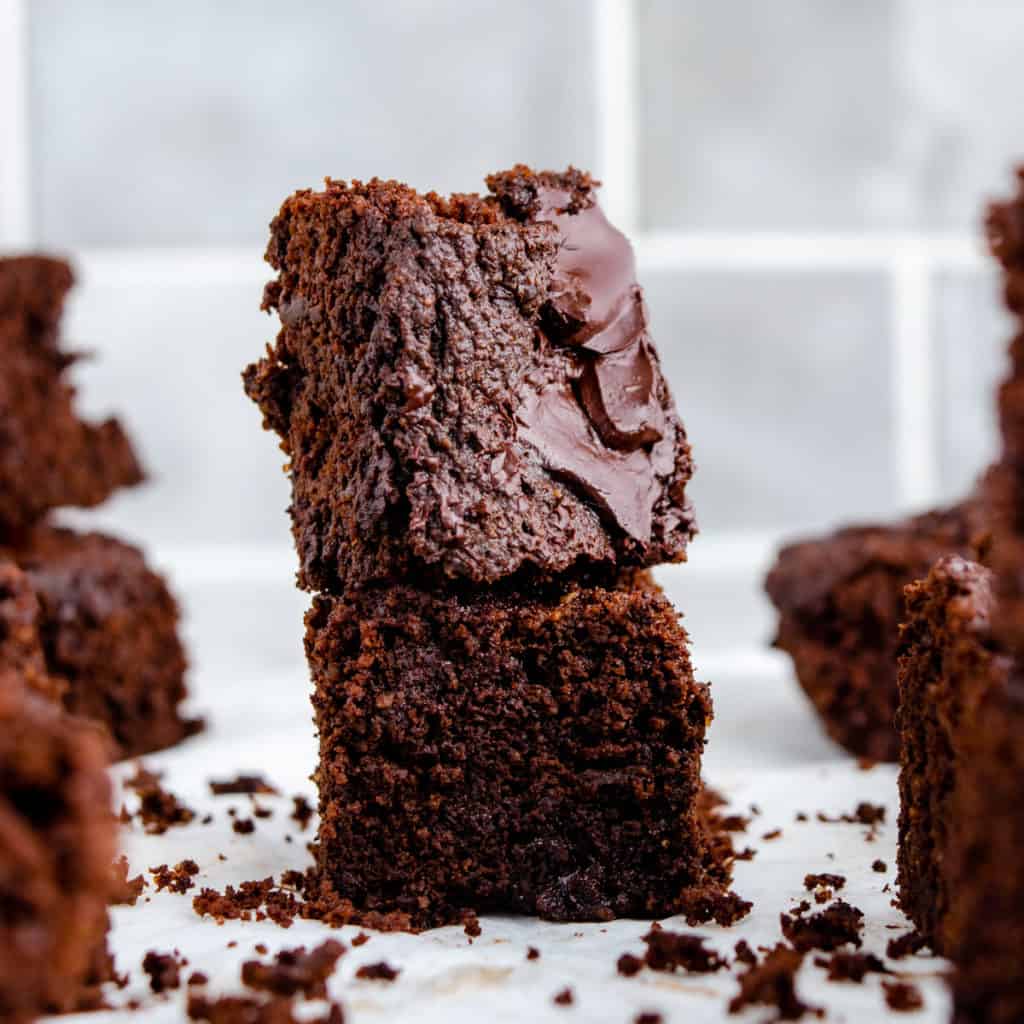 A stack of fudgy low carb two bite brownies