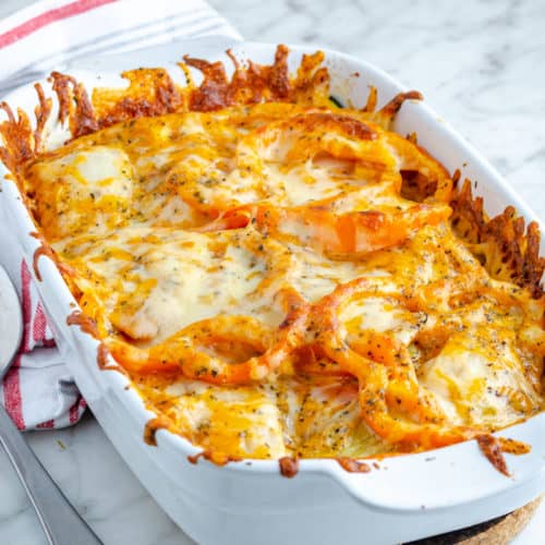 10 layer low carb casserole om a white dish