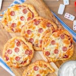Keto mini Pizzas on a game table for game night