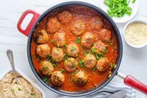 Italian Meatballs in a pan on a white background