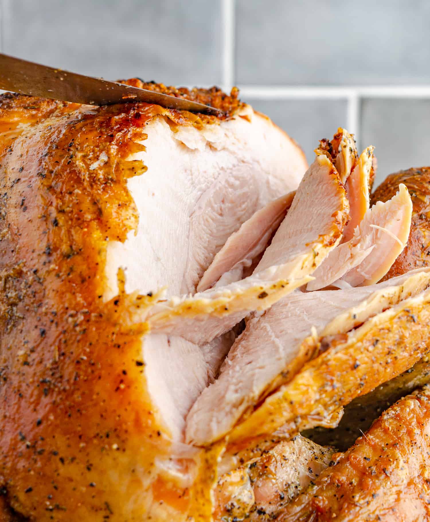 Sliced dry brined turkey with juicy meat